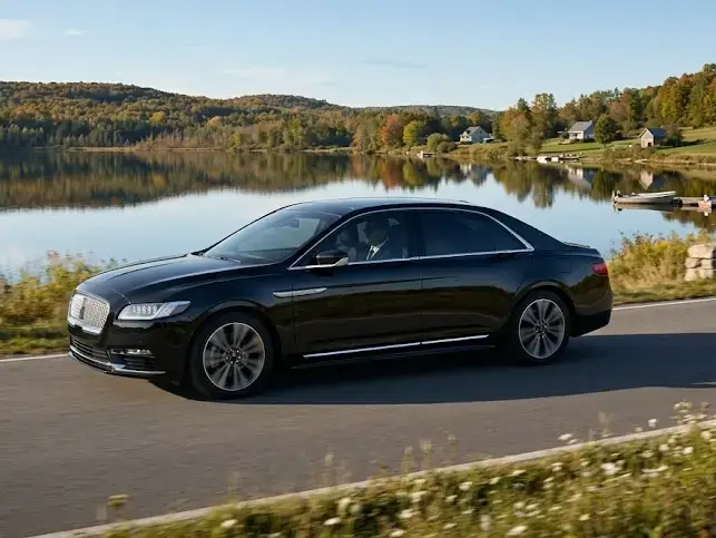 Kawartha Lakes airport limo service with luxury black car arriving for passenger pickup